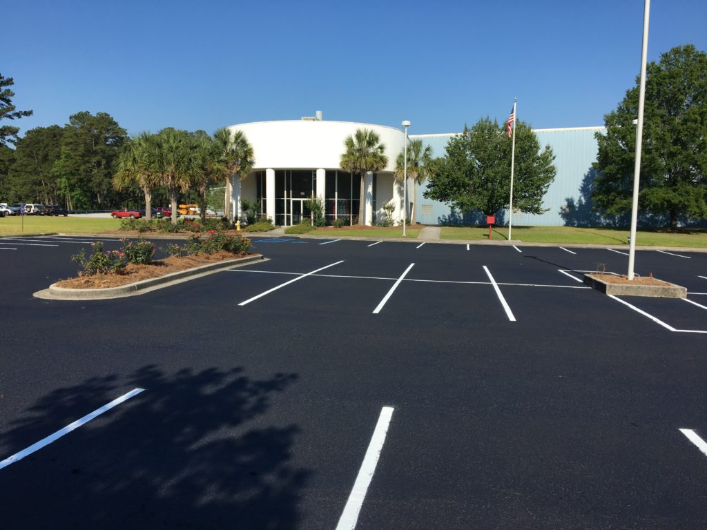 parking lot with new seal coating and line striping