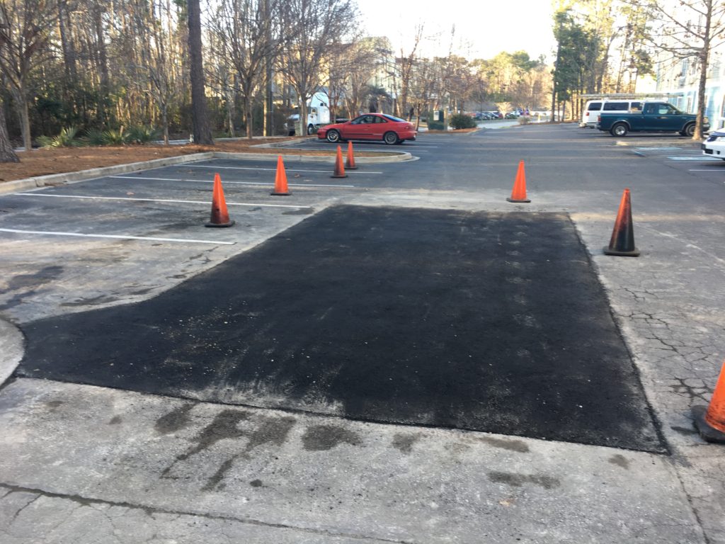 asphalt repair in a parking lot