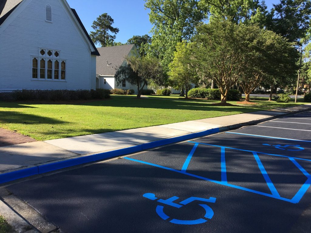 Church parking with blue handicap markings